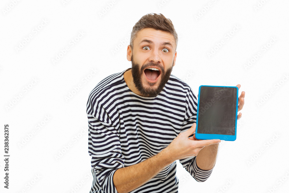 Nice emotional man showing you the tablet