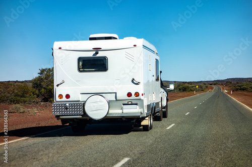 An off-road SUV car towing a caravan in Western Australia