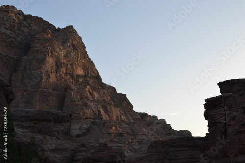 Petra, Jordan - ancient Nabatean city in red natural rock and with local bedouins, UNESCO world heritage