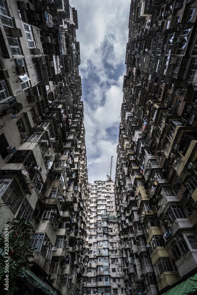 A small strip of sky between appartment buildings in Hong Kong