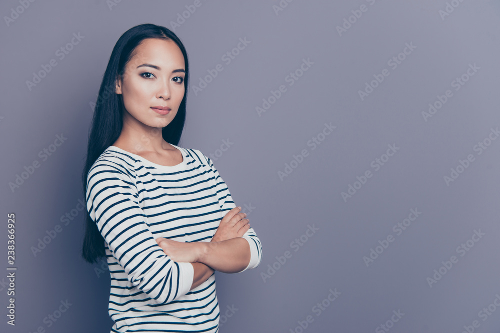 Obraz premium Close up side profile photo of not smiling seriously standing she her girl diligent student worker wearing white striped pullover isolated on grey background