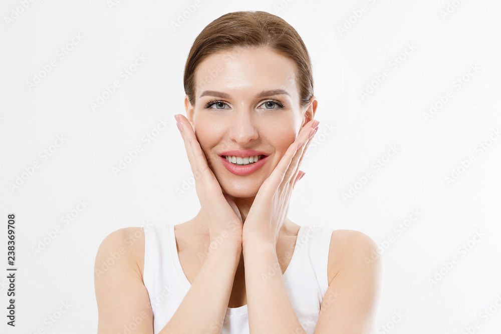 Young beautiful woman touching clean fresh face skin . Anti aging concept. Facial treatment . Cosmetology , Beauty and spa. Isolated on white Young beautiful woman touching clean fresh face skin . Anti aging concept. Facial treatment . Cosmetology , Beauty and spa. Isolated on white