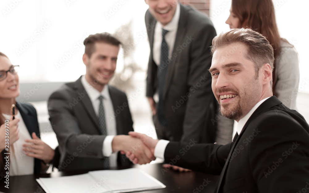 Business people doing handshake after agreement Business people doing handshake after agreement