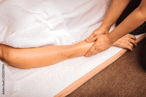 Top view of a female hand during oil massage