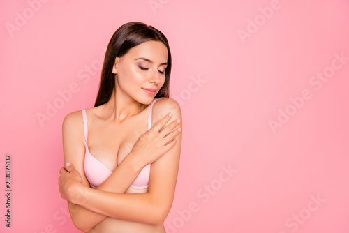 Close up portrait of cute nice attractive gentle beautiful she her girl closed eyes concentrated on trying new flavour  in pink underwear isolated on pink background
