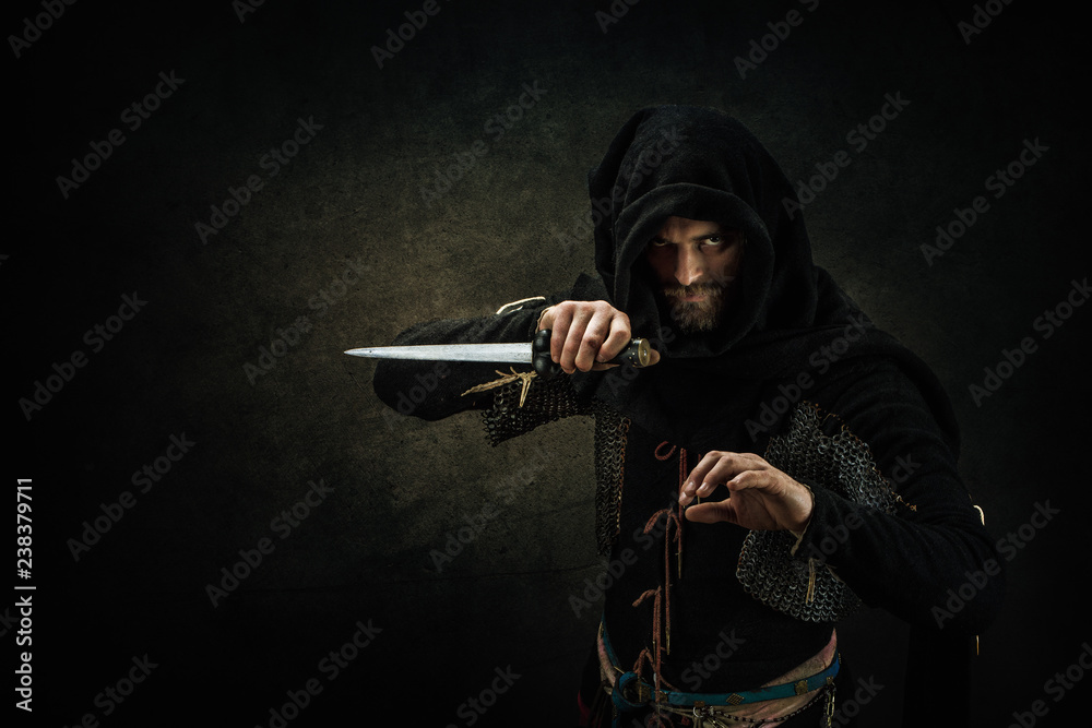 Portrait of a medieval assassin - obrazy, fototapety, plakaty 