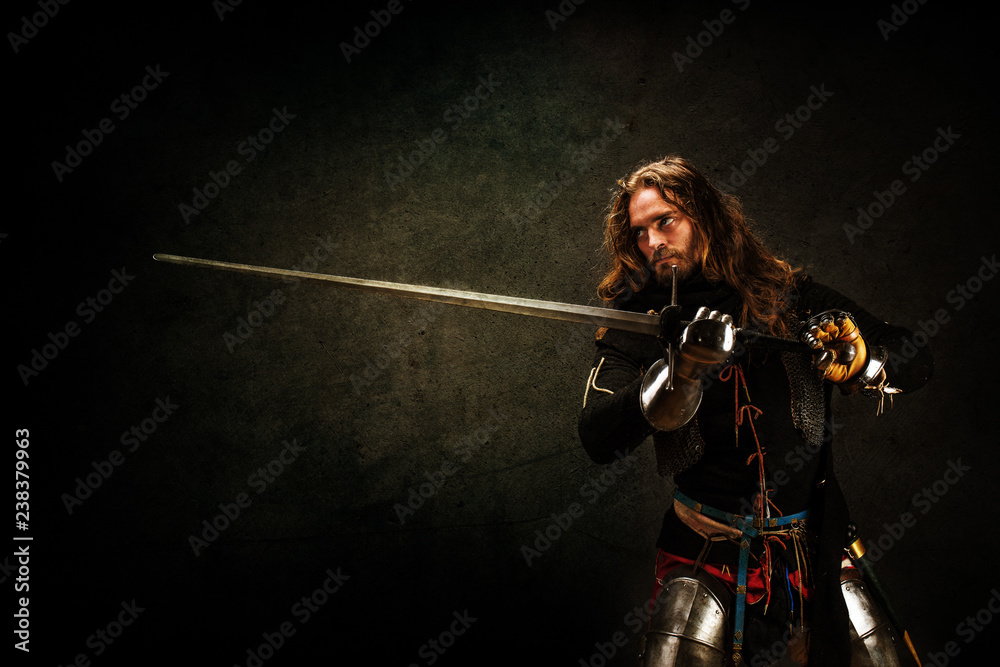 Portrait of a knight armed with a claymore
