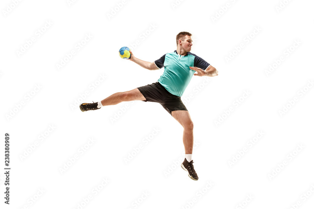 The fit caucasian young male handball player at studio on white background. Fit athlete isolated on white. The man in action, motion, movement. attack and defense concept The fit caucasian young male handball player at studio on white background. Fit athlete isolated on white. The man in action, motion, movement. attack and defense concept