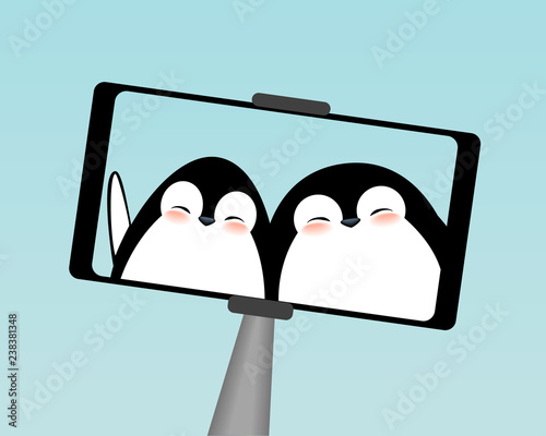 Winter cute penguins selfie on smartphone.
