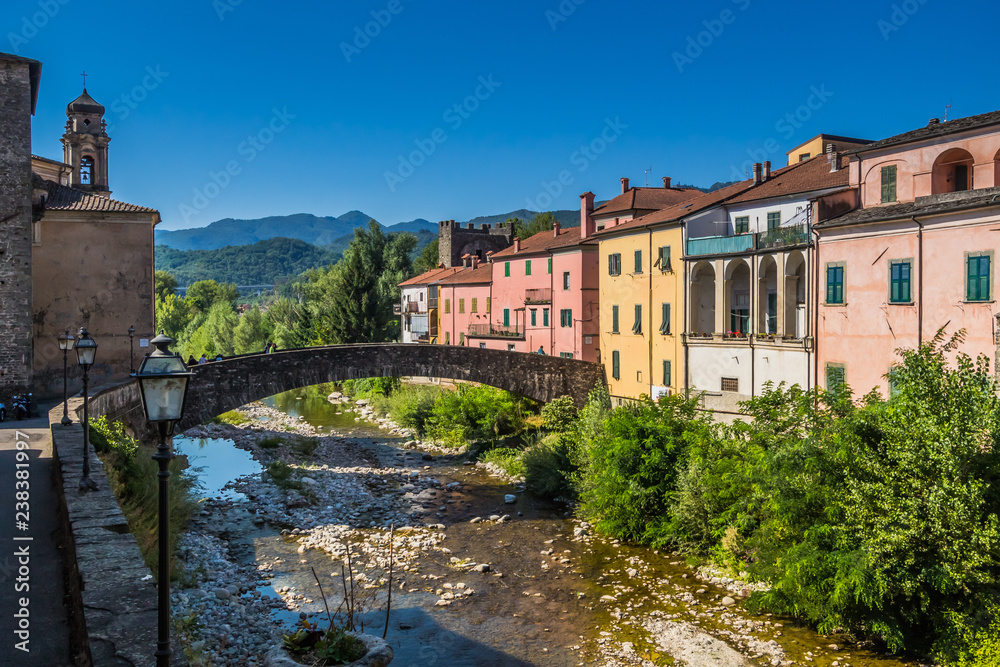 Tuscan town of Pontremoli with a view of the colorful homes on the banks of the river Magra. Pontremoli is a town in the region of Tuscany, Italy. 