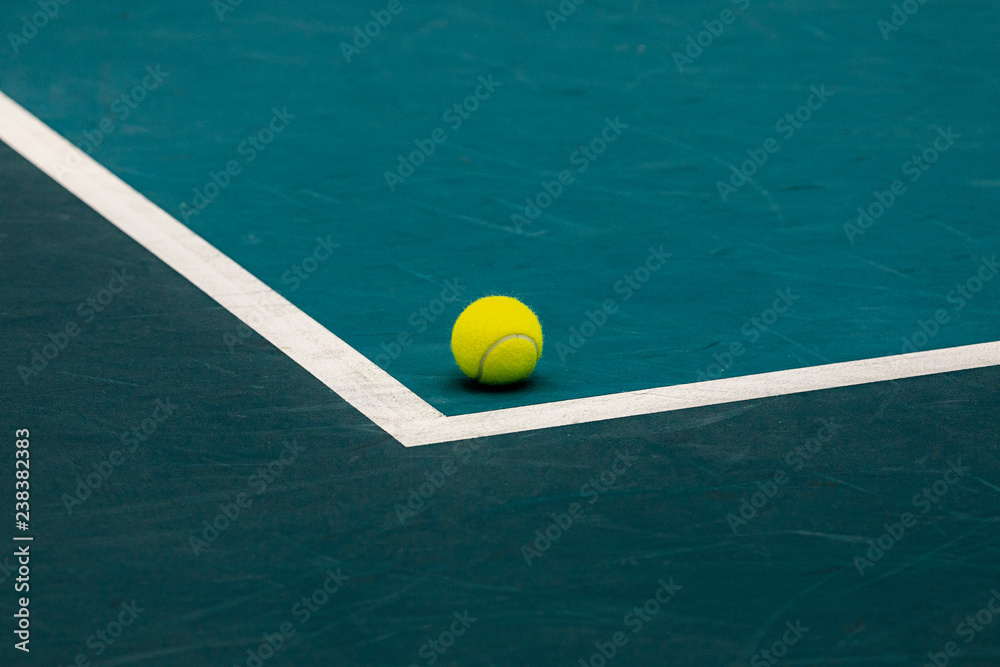 Tennis ball on a court