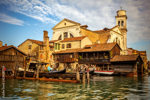 Boatyard in Venice with church