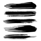 Black abstract textured long thick paint strokes isolated on white background