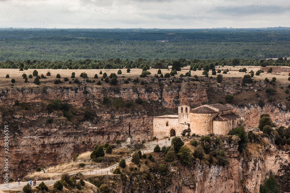 Long view of San Frutos hermitage near Duraton Canyon in Segovia. Castilla Leon, Spain
