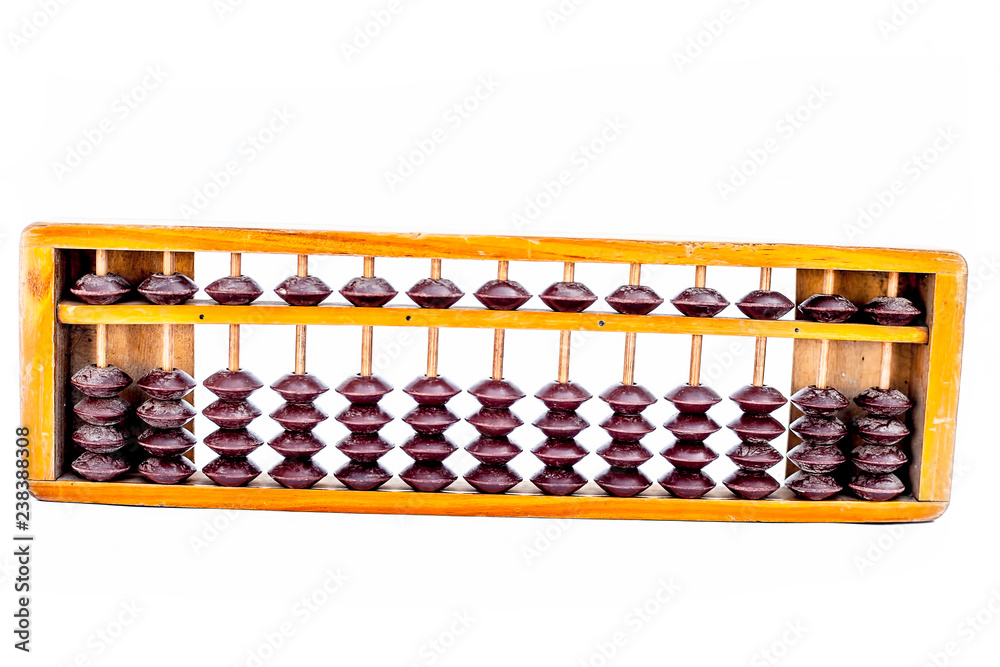 Close up of wooden abacus or counting frame with brown colored beats in it.Isolated on white. Close up of wooden abacus or counting frame with brown colored beats in it.Isolated on white.
