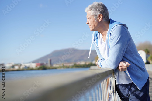  Relaxed senior man outdoors in sportswear