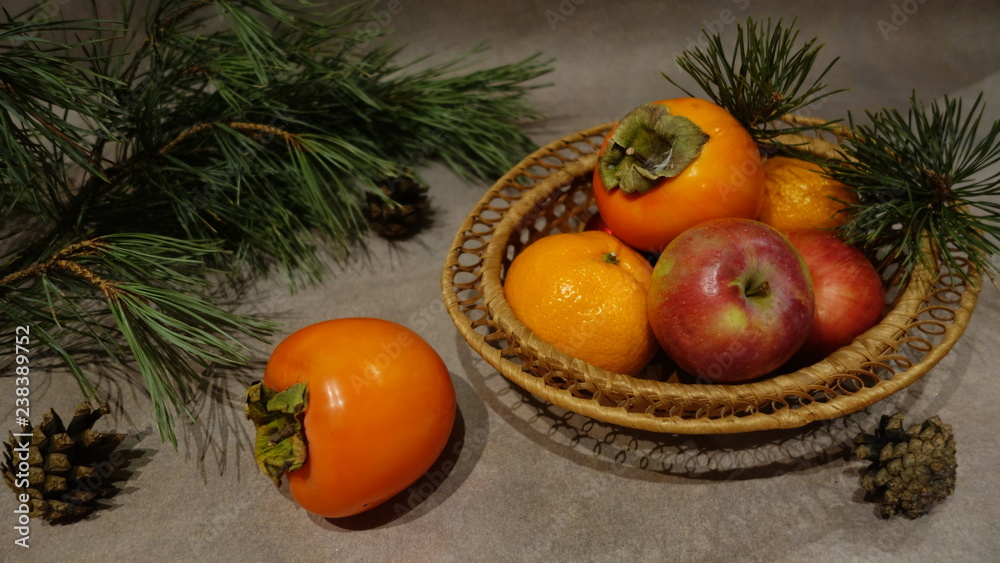 Christmas still life with fruit. Persimmon, Apple, tangerine Christmas still life with fruit. Persimmon, Apple, tangerine