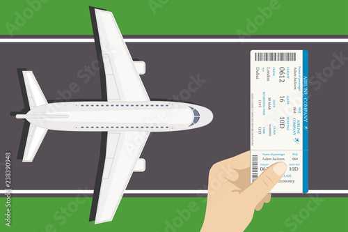 Airplane on the runway top view,hand holding boarding pass