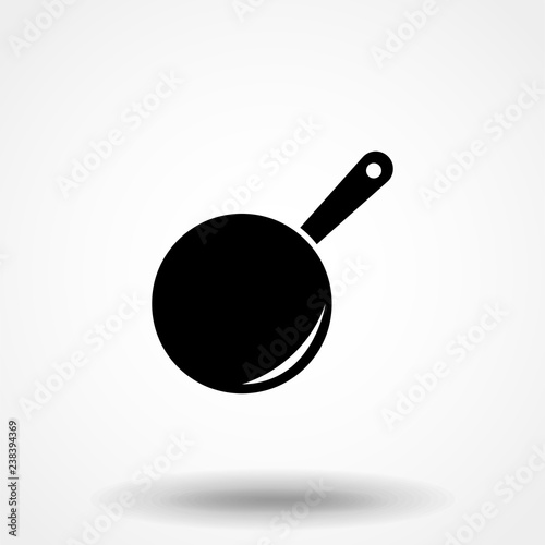 Frying pan icon. Drop shadow pictogram. Isolated skillet black illustration. Frying pan logo concept. Vector silhouette icon