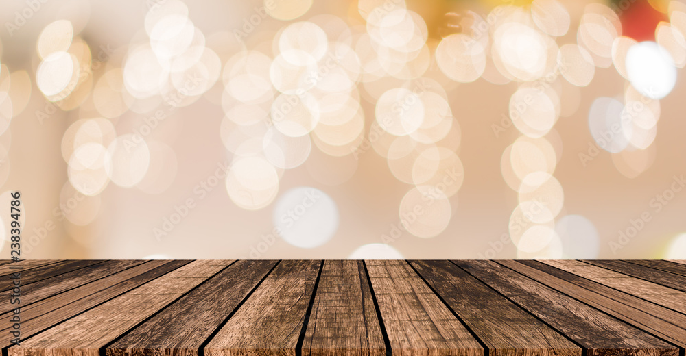 abstract blurred golden background with bokeh light and wood plank for advertise , promote or show product on montage display abstract blurred golden background with bokeh light and wood plank for advertise , promote or show product on montage display