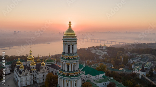 Skyline, Kiev city with beautiful morning sky. Pedestrian bridge. Left bank the Dnieper River.