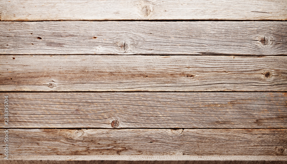 Empty wooden shelve in front of wooden wall Empty wooden shelve in front of wooden wall