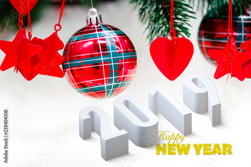 Shiny red christmas balls, heart and stars on white with pine tree for new year with 2019 text