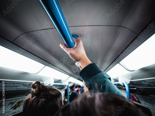 Canvas Print Crowd of people during rush hour in London Tube subway interior, London, United Kingdom