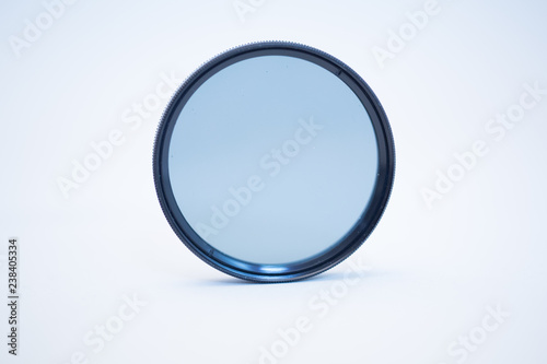 Fotografia polarizing photo filter on white background, perfect circle