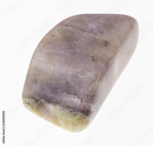 tumbled cancrinite gem stone on white photo