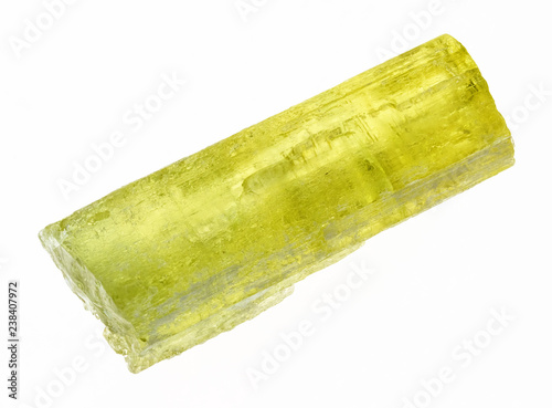 raw heliodor (yellow beryl) crystal on white photo