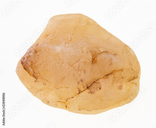 tumbled Calcite gem stone on white