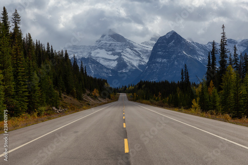 Beautiful view of a scenic road in the Canadian Rockies during Fall Season. Taken in Icefields Pkwy, Jasper, Alberta, Canada.