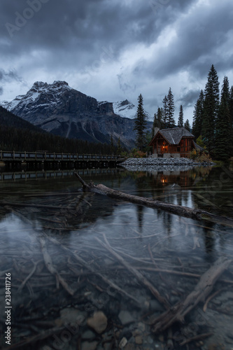 Beautiful view of a cabin near a glacier lake with Canadian Rocky Mountains in the background. Taken in Emerald Lake  British Columbia  Canada.