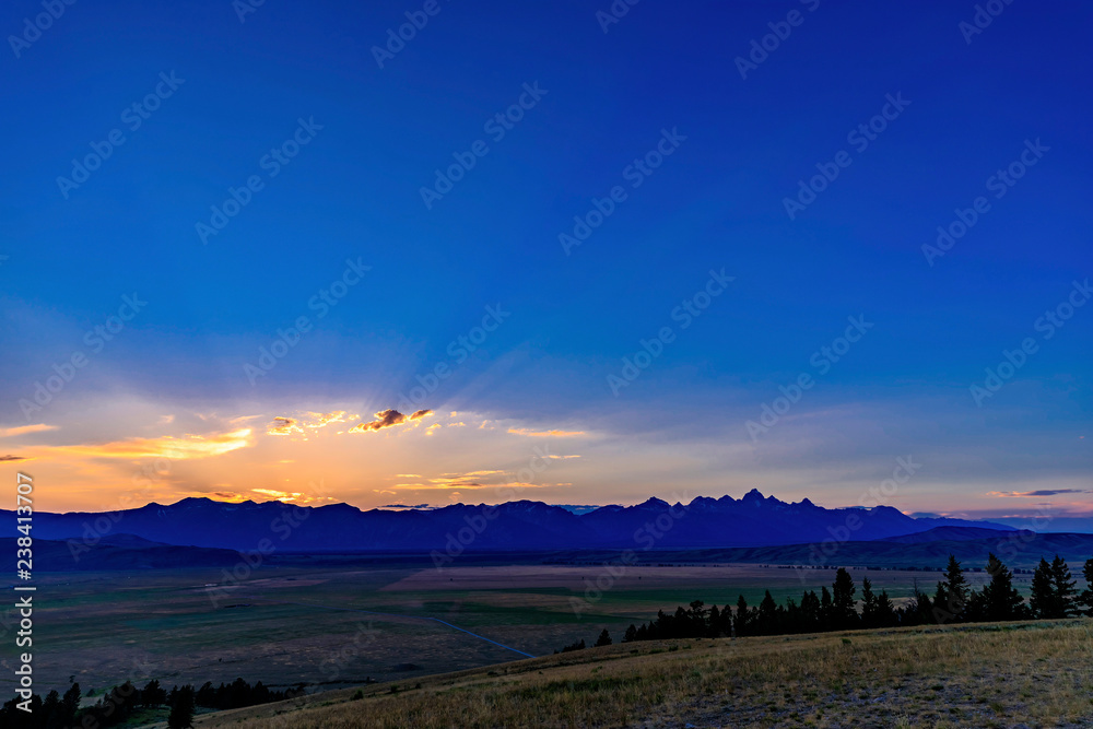 Obraz premium Sunset Overlooking Tetons, Sun Rays