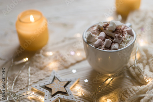 Winter hot drink, cacao with marshmallows and christmas decorations, spicy hot chocolate