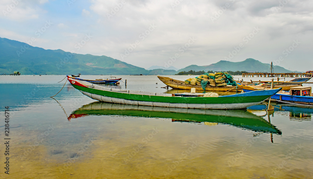Bright boats on the oyster lageen near Hue Vietnam
