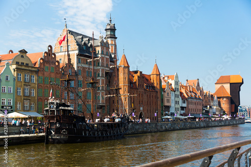 Sunny day of Motlawa river embankment in historical part of Gdansk, Poland