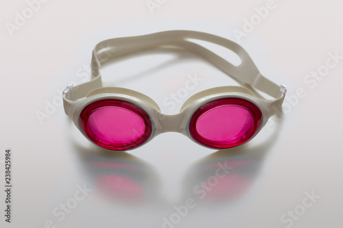 Pink swimming goggles