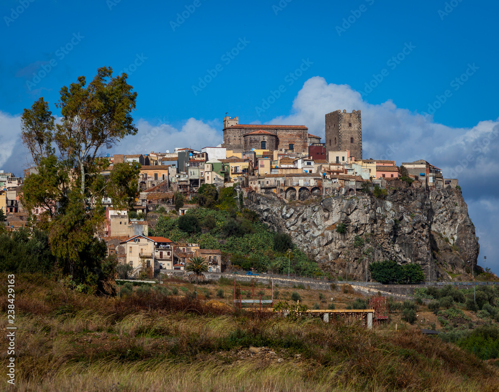 Sicilian Town named Motta on a cliff with a castle - Italy