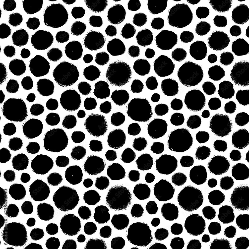 Black and white polka dot seamless pattern. Hand drawn vector ornament for wrapping paper. Black and white polka dot seamless pattern. Hand drawn vector ornament for wrapping paper.