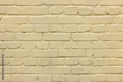 Pale yellow brick wall