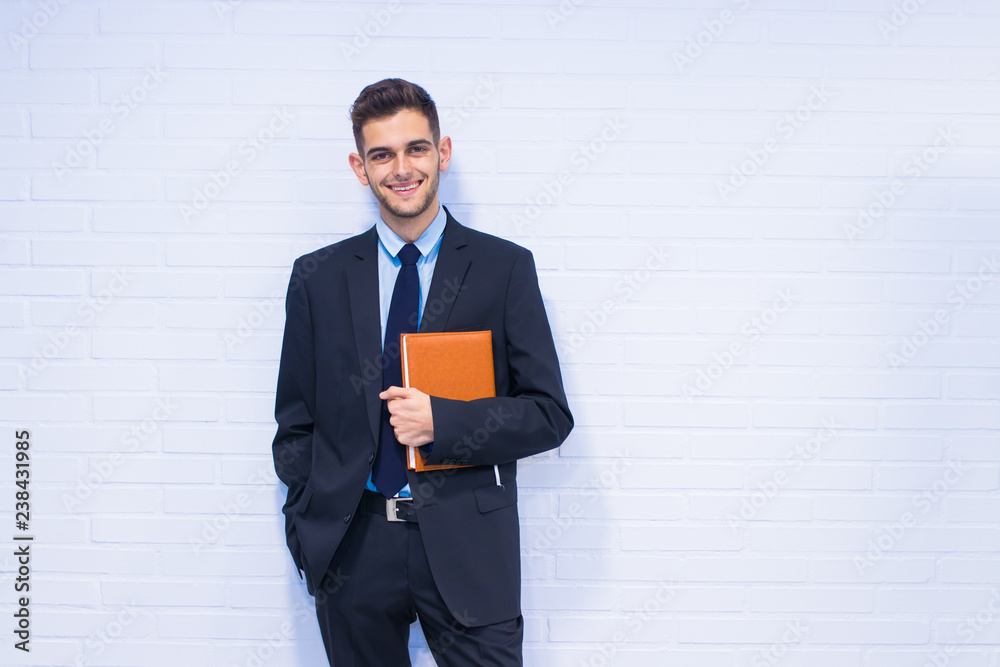 business man with book or agenda business man with book or agenda