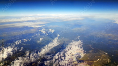 Clouds and land below