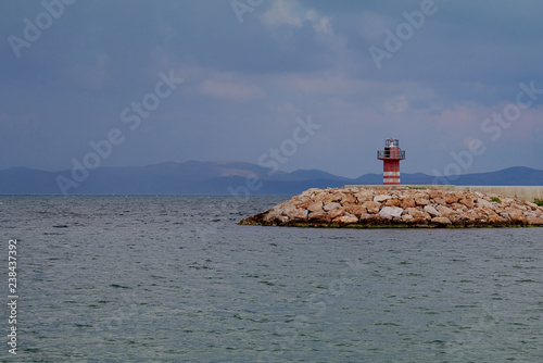 lighthouse on coast of sea
