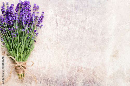Fototapeta Naklejka Na Ścianę i Meble -  Lavender flowers, bouquet on rustic background, overhead.