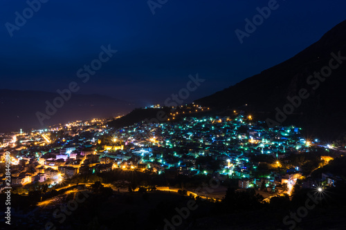beautiful view of chefchaouen at night, from the spanish mosque on the top of the city. long exposure of chefchaouen, Morocco.
