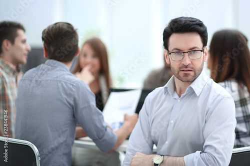 close up.successful businessman against the background of the business team