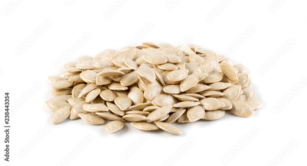 Squash, pumpkin or melon seeds isolated on white background Squash, pumpkin or melon seeds isolated on white background