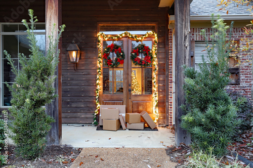 Photography Shipping packages on porch during holiday season
